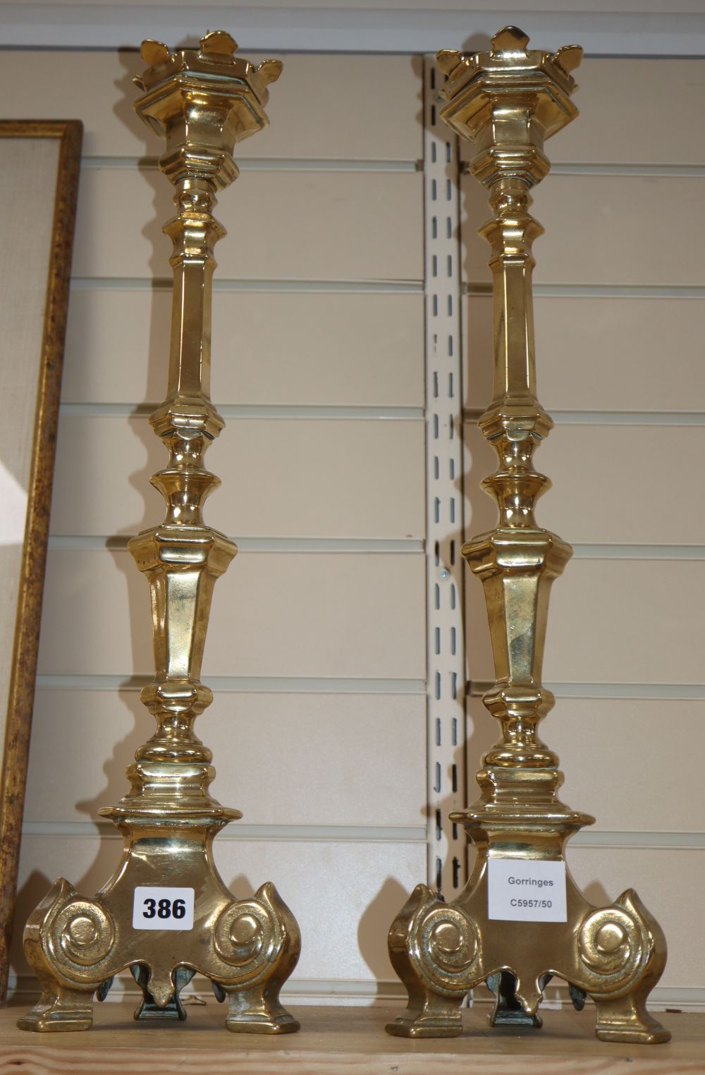 A pair of Florentine style brass pricket candlesticks, height 56cm